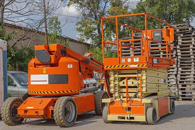 forklift transporting goods in a large warehouse in Fallbrook, CA